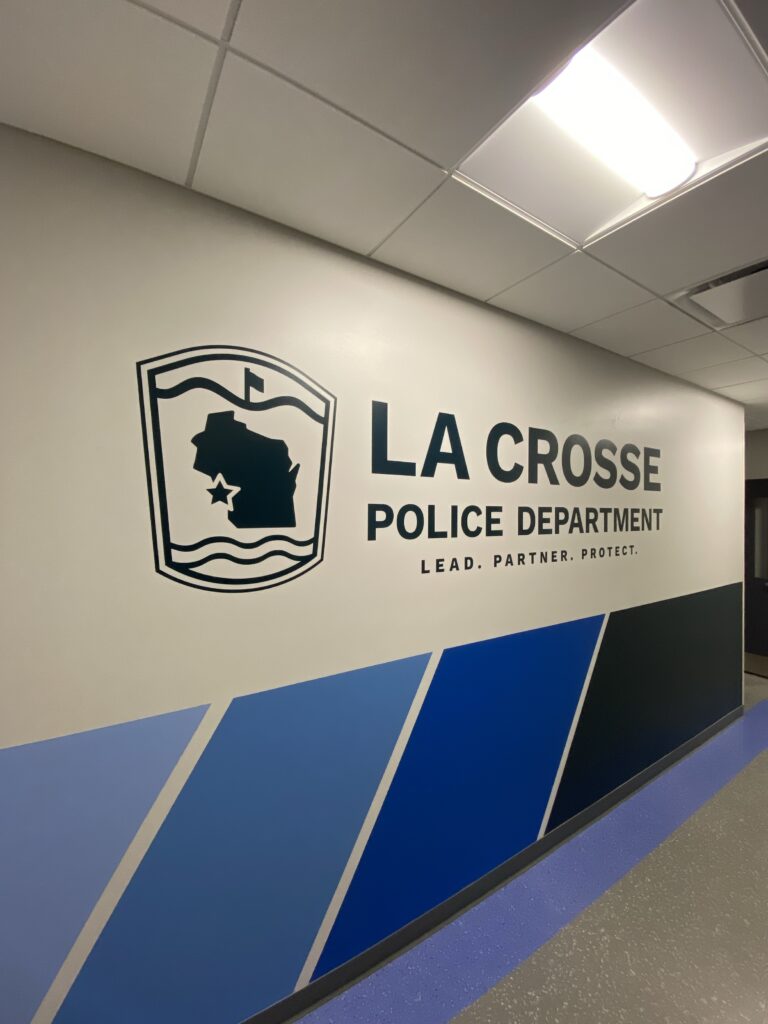 La Crosse Police Department custom interior signage stickers/wall decor which was designed, made, and installed all by Sign Pro of La Crosse, WI.